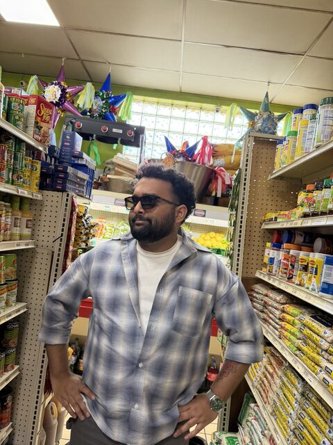 Tanmay in the aisle of an Indian grocery store