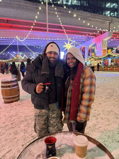Tanmay at a Christmas market in the snow