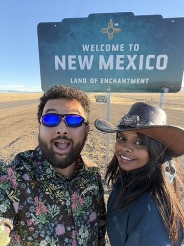 A selfie at the Welcome to New Mexico state line sign